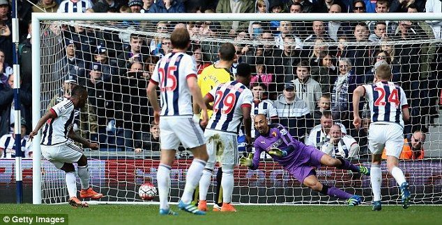 Gomes saving a Berahino penalty