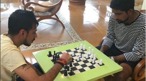 Yuzvendra Chahal (L) is seen playing chess with Is Sodhi