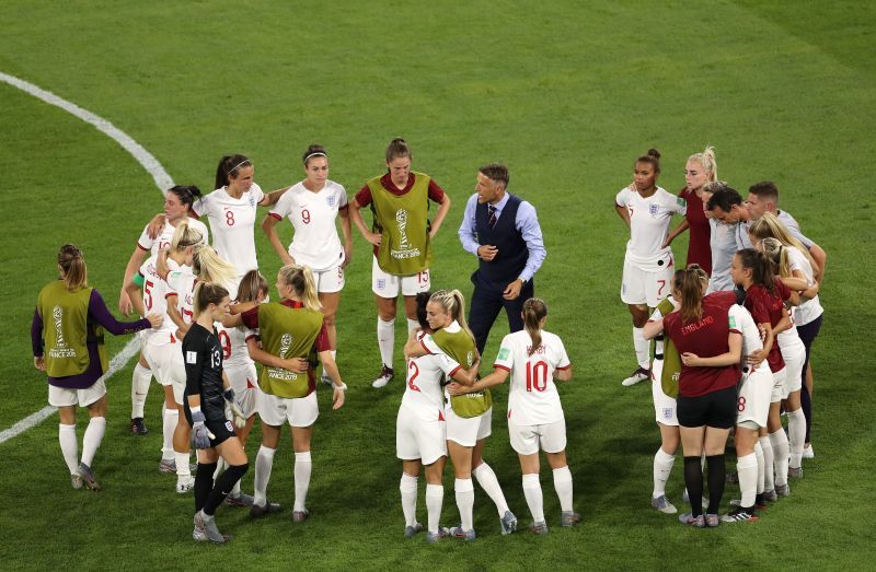 Neville addresses his players after the World Cup semi-final defeat to the United States