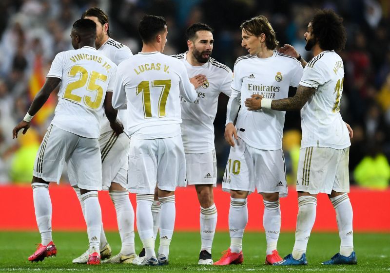 Real Madrid celebrates after scoring a goal against FC Barcelona.