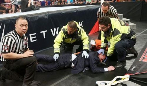 Brock Lesnar leaves Michael Cole in pain