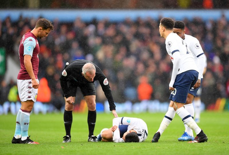 Son on the receiving of a crunching tackle in a game against Aston Villa