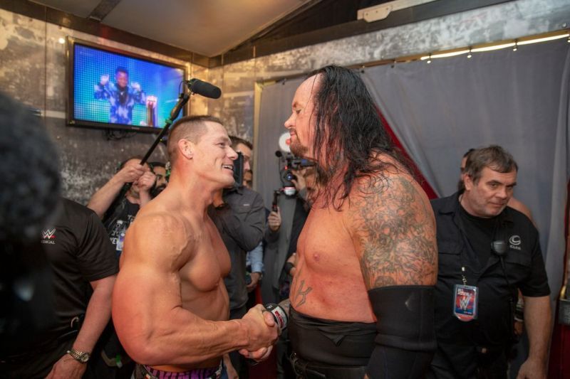 Undertaker and John Cena embrace after their match