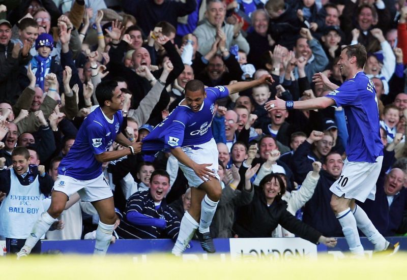 Vaughan celebrates his goal against Crystal Palace with Tim Cahill and Duncan Ferguson at Goodison
