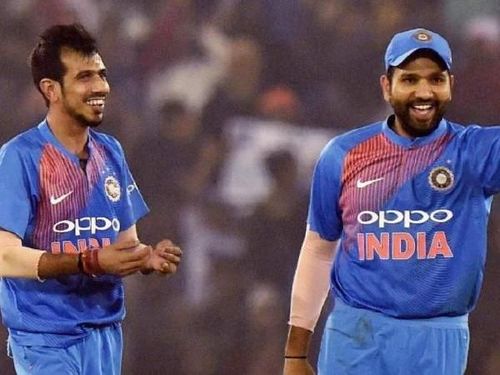 Yuzvendra Chahal (left) and Rohit Sharma