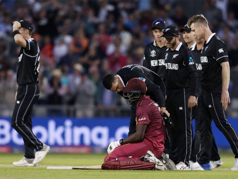 NZ players consoling the devastated Carlos Braithwaite after his exceptional effort.