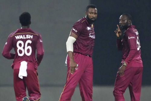 Kesrick Williams (right) along with West Indies T20 captain Kieron Pollard (centre)