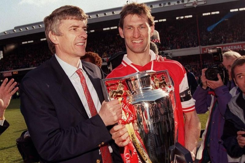 Wenger celebrating the PL win in 1998 with Arsenal legend Tony Adams