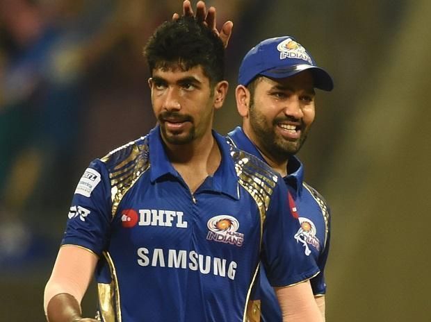 Jasprit Bumrah (L) and Rohit Sharma