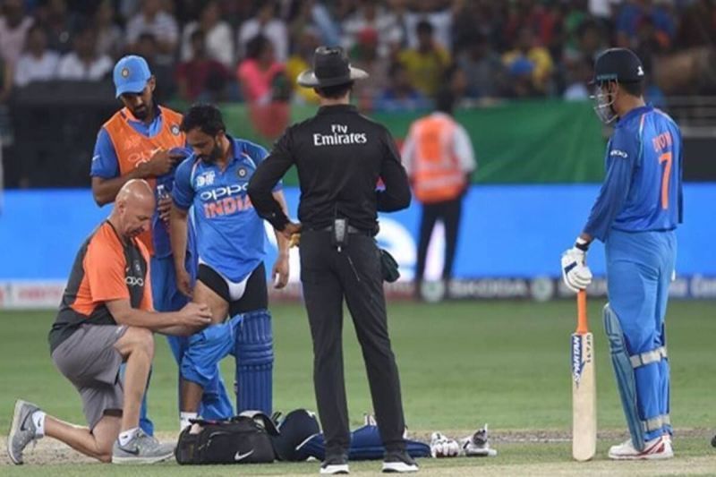 Kedar Jadhav receiving treatment after pulling his hamstring