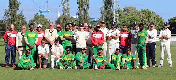 Vanuatu National Team pose with members of Prahran Cricket Club after a match