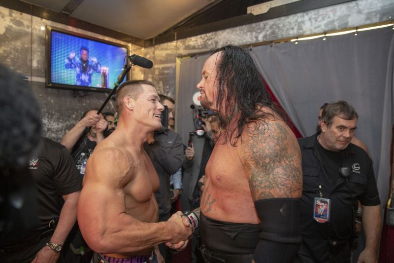 Undertaker and John Cena embrace backstage