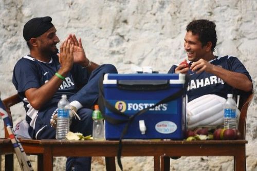 Harbhajan Singh (left) and Sachin Tendulkar sharing a light moment