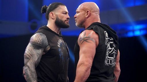 Roman Reigns and Goldberg