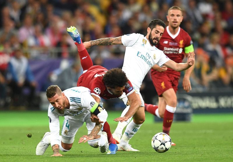 Real Madrid&#039;s Sergio Ramos in a duel with Liverpool&#039;s Mo Salah