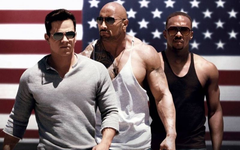 Promotional poster for Pain and Gain starring Mark Wahlberg and Dwayne Johnson