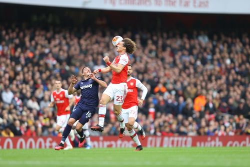 David Luiz battling for the ball with Pablo Fornals