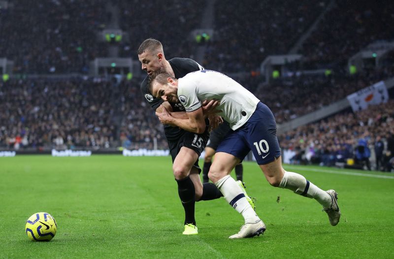 Kane grappling with Webster in an EPL clash