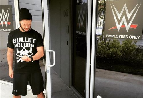 Finn Balor in a Bullet Club T-shirt