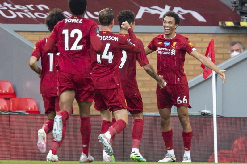 Trent celebrates his goal with his teammates