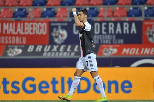 Juventus secured a 2-0 victory over Bologna to go four points clear at the top of Serie A