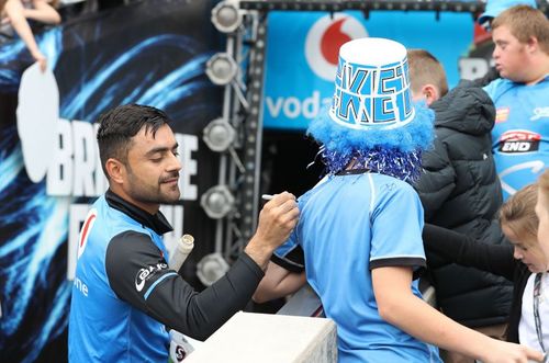 Rashid Khan signing autographs before a BBL Knockout match. 