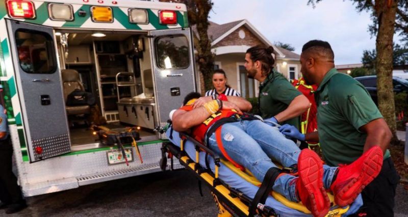 Elias being stretchered out as part of a storyline injury on SmackDown