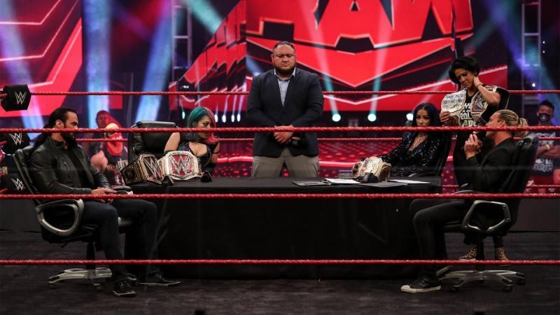 Samoa Joe curating a double contract signing