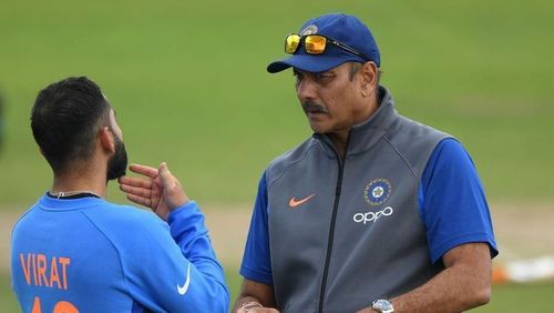 Virat Kohli (L) and Ravi Shastri (R)