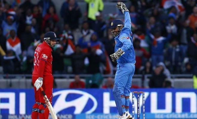 MS Dhoni celebrates the Champions Trophy triumph