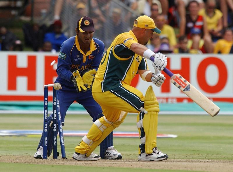 Australian batsman Darren Lehmann is bowled by Sri Lankan captain Sanath Jayasuriya for 36, as wicketkeeper Kumar Sangakkara looks on. (Picture: Getty Images)