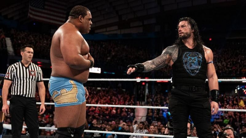 Roman Reigns and Keith Lee share a moment during Survivor Series 2019