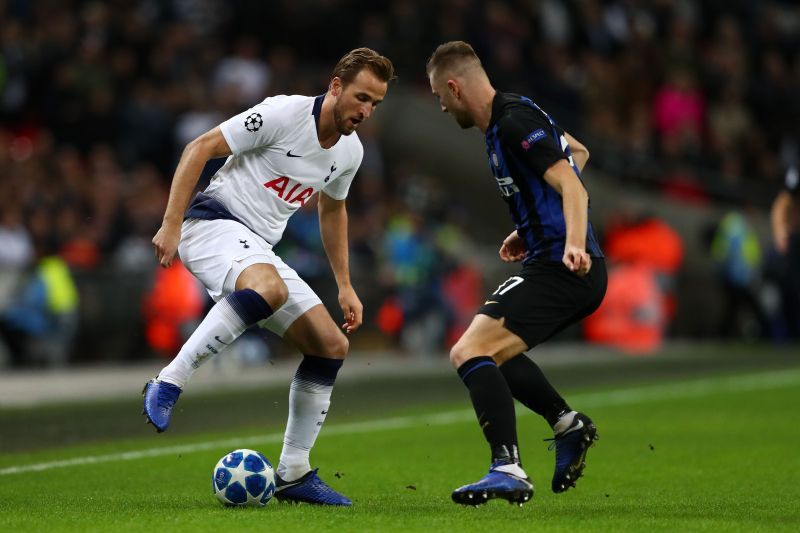 Skriniar(right) goes up against Harry Kane (left)