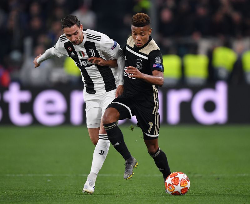 Mattia De Sciglio tussles with Ajax&#039;s David Neres