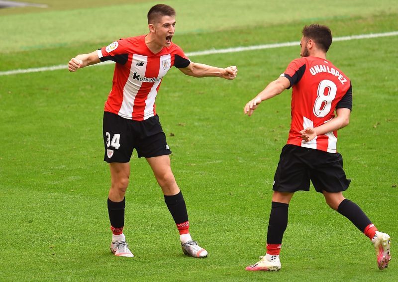 Lopez (no.8) in happier times vs. Mallorca last month - the midfielder was impressive against Real Madrid