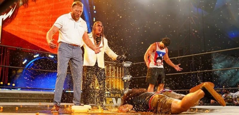 Jake Hager (left) alongside The Inner Circle after Orange Cassidy dumps orange juice on the stable.