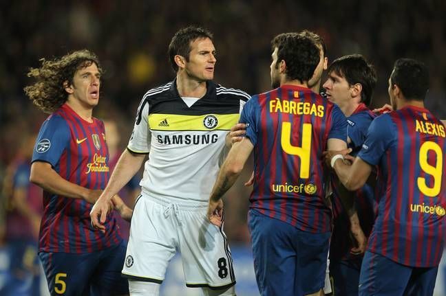 Cesc Fabregas and EPL manager Frank Lampard get into a tussle during Chelsea vs. Barcelona