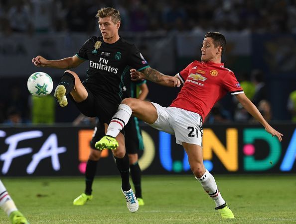 Real Madrid star Kroos in action against Manchester United