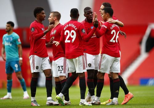 Manchester United stars celebrating after a goal against Bournemouth in their 5-2 win