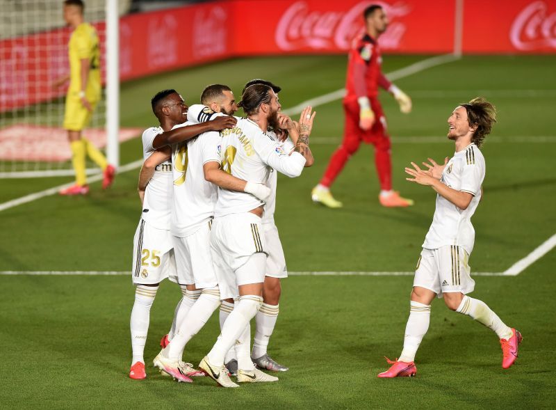 Karim Benzema celebrates scoring the second goal from a penalty against Villarreal