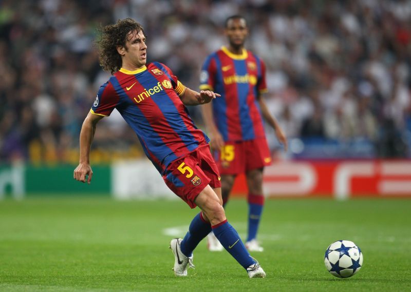 Carles Puyol wearing a Barcelona shirt with the UNICEF logo