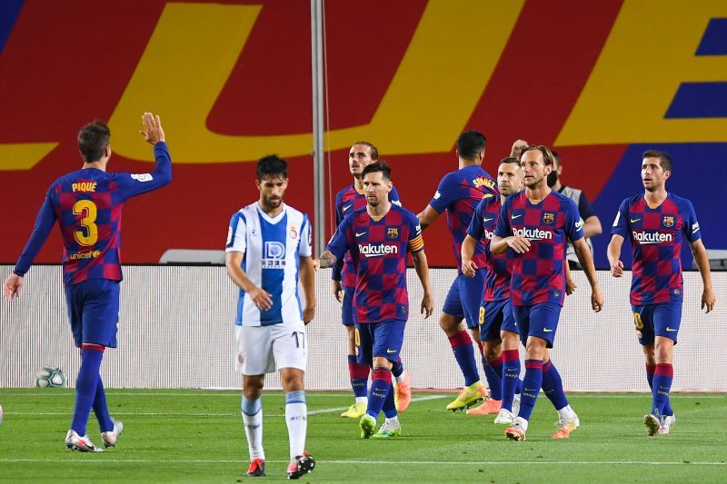 Barcelona players celebrate after Suarez&#039;s close-range finish breaks the deadlock just before the hour mark