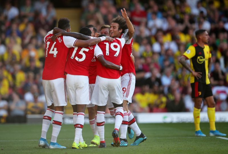 Arsenal celebrating a goal against Watford in their previous encounter