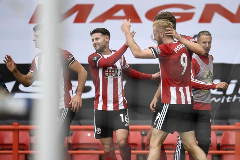 Sheffield United players celebrate their goal against Chelsea