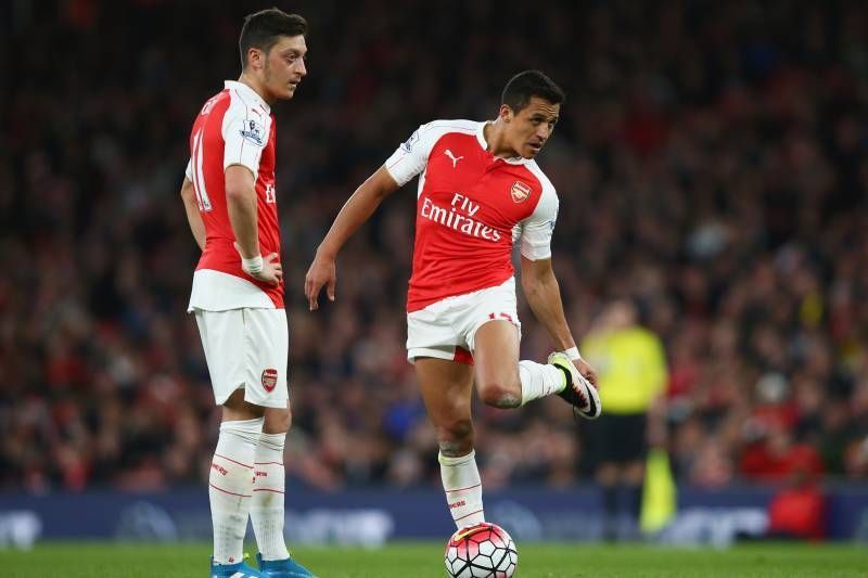 Mesut Ozil (left) and Alexis Sanchez