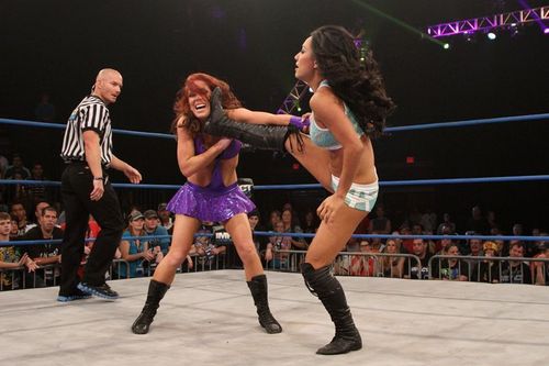 Gail Kim with here Eat Defeat finisher