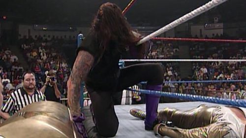 The Undertaker vs Goldust in a casket match