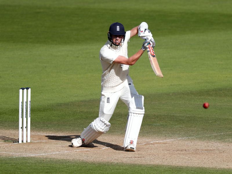 England&#039;s Zak Crawley punches through the cover region.