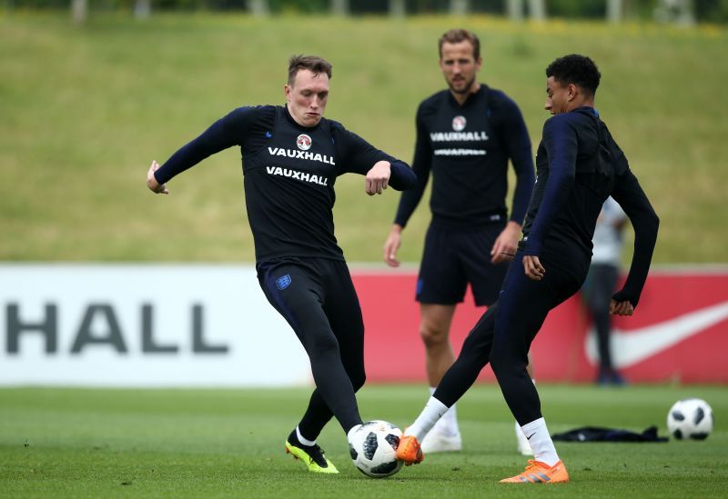Phil Jones (left) and Jesse Lingard (right) in England training