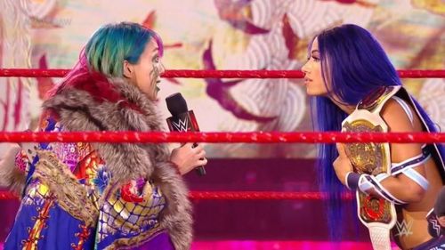 Asuka and Sasha Banks face to face